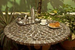 Mosaic tables and wrought iron furniture